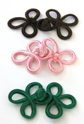 Basic passementerie frog closures in brown, green, natural white, black and pink