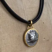 ANCIENT COIN ON LEATHER NECKLACE