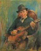 Elderly man playing a guitar