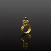 A Byzantine Garnet and Gold Domed Finger Ring, Byzantine Empire, ca. 5th - 7th century CE