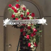 Cross shaped wreath of roses and orchids - F175W06