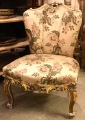 1940s French Slipper Upholstered and Parcel-gilt Chair With Floral Motifs