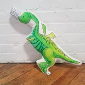 Eliot the Dragon throw pillow — Drumming Beetle