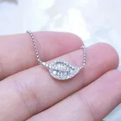 0.29CT Baguette and Round Cut Diamond Floral Pendant