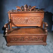 Lot 003 - Antique Renaissance Revival Carved Oak Hall Bench with Lift-Top Storage, Green Man, Griffin and Shield Crest, 50-1/8" L x 49-1/4" H
