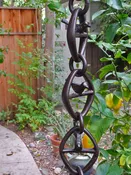 #BC03-BRZ Bird On a Wire Link Chain Cast Aluminum with Bronze Powder Coating