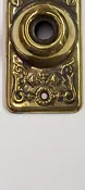 Antique Stamped Brass Door Bell Cover by Reading Hardware Co. "Clifton" Design