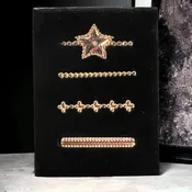 $2 4 Piece Rose Gold Star Watch Band Charm Set