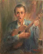 Young man playing a guitar and singing