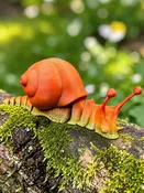 3D Printed vibrant snail nice addition to any desk, bookshelf, or garden-themed decor. — Olgas Treasures