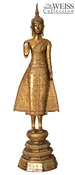 A Brass Standing Buddha Figure