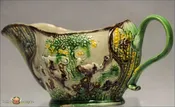 An Antique English Creamware Landskip Sauceboat, c1770-80