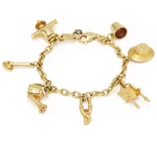 18K Yellow Gold Gardening Motif Charm Bracelet by Cartier, Serial FL34486