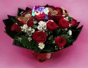 2 DZ OF ROSES WRAPPED IN PAPER