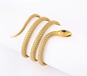 American 14kt Gold Woven Flexible Bracelet with Diamond Eyes and Sapphire