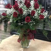 Long stem roses with baby’s breath.