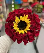 30 roses and a sunflower.