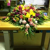 Elegant Pink and Yellow Casket Tribute