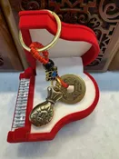 Keychain with copper coin and money bag