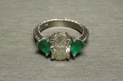 18KT White Gold 2.93TCW Oval Light Yellow Diamond Solitaire &amp; Trillion cut Emerald Engagement Ring