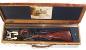 BRITISH 10 BORE DOUBLE HAMMER SHOTGUN BY “WILLIAMS & POWELL” IN IT’S ORIGINAL CASE WITH ACCESSORIES