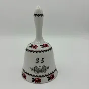 Ceramic bell in white, red and black