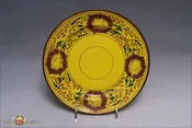 An Antique Creamware Plate in yellow Glaze in copper lustre decoration from Swansea, c1820