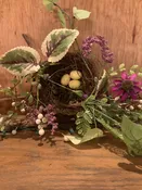 Bird nest with twigs and flowers — Aunt Jennie's Attic