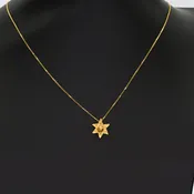 A Byzantine Gold Star Pendant, Eastern Mediterranean, ca. 6th–8th century CE