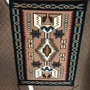 Authentic Navajo Handwoven wool rug by Mary Frank.  38.5“ x 28”