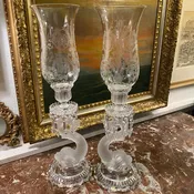Pair of dolphin Baccarat candle holders