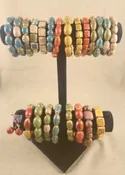 ASSORTED CLAY BRACELETS AND MATCHING EARRINGS