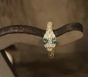 Snake Huggie Earring in Gold , cute little hoop earring with snake detail. — iBoutique