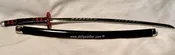 Katana Samurai All Metal Sword 9.75″ for Dolls (Scabbard Black Lacquer with Red Disc Collar/Handle Black Braid w/Diamond Pattern)