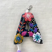 a hand embroidered keychain