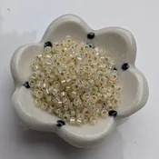 11/0-577 Gilt Lined Pale Yellow