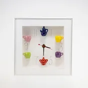10x10 Clock with a Navy Teapot in a Silver Frame