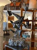Silverman Sculpture with Rock Base — At Hom
