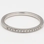 0.05 Carat Round Brilliant I SI1 Diamond Platinum Band Ring