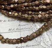 2mm Faceted Indonesian Spacer – Brass
