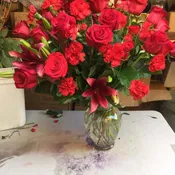 A Radiant Bouquet of 24 Red Roses, Lilies, and Carnations