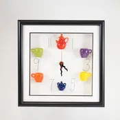 10x10 Clock with a Red Teapot and Blue Sugar Jar in a Black Frame