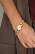 Adria Gold Circle Face Watch