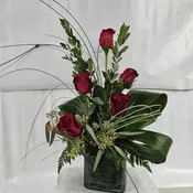 Clear cube of red roses!