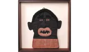 African American Pot Holder in Vitrine