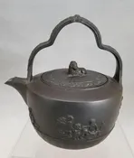 An Antique English Black Basalt Rum Kettle impressed Turner, 1824-1829