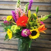 Bright designer's choice  fresh flower arrangement