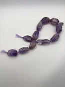 Unfinished strand: Large Faceted Chunky Amethyst Light