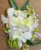 WHITE DENDROBIUM ORCHID WITH IRIDESCENT ACCENTS