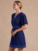 Textured Star Pattern Belted Mini Dress